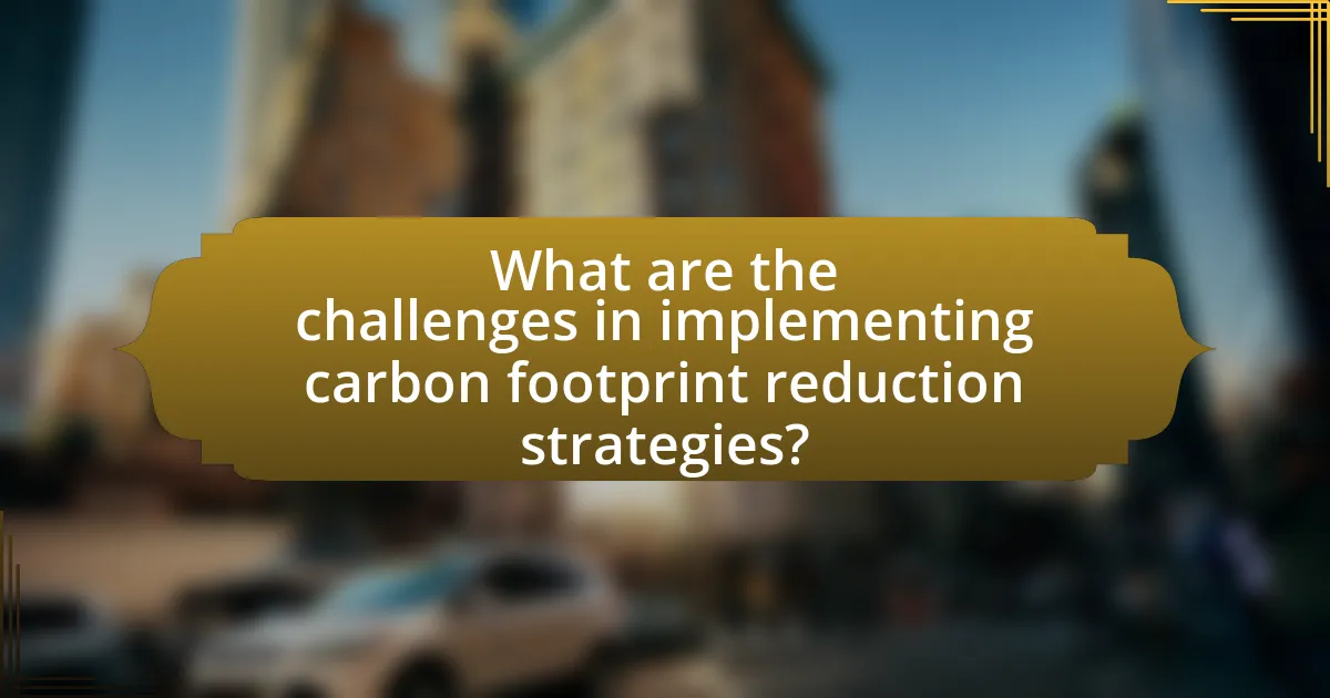What are the challenges in implementing carbon footprint reduction strategies?